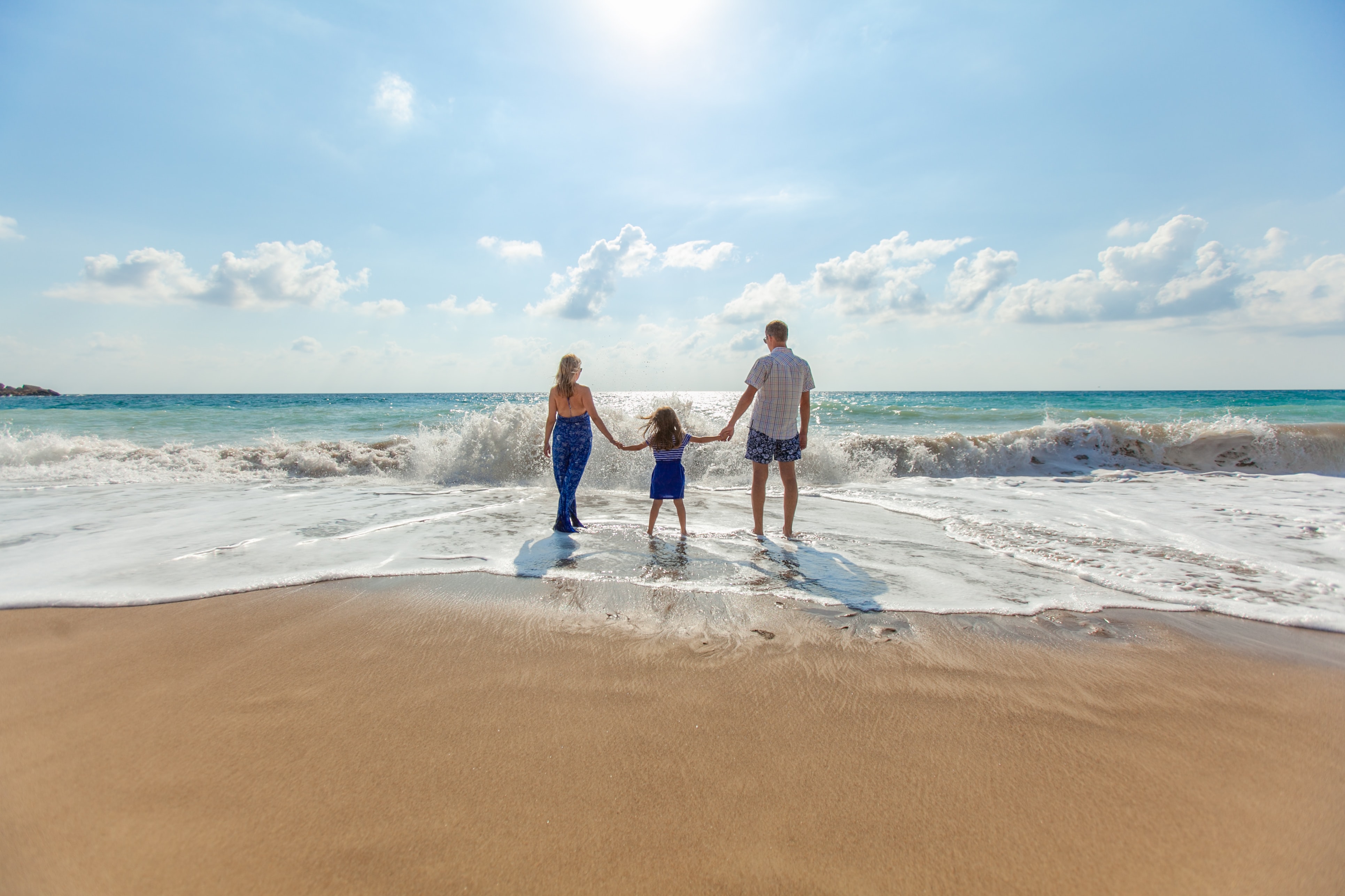 People entering the ocean