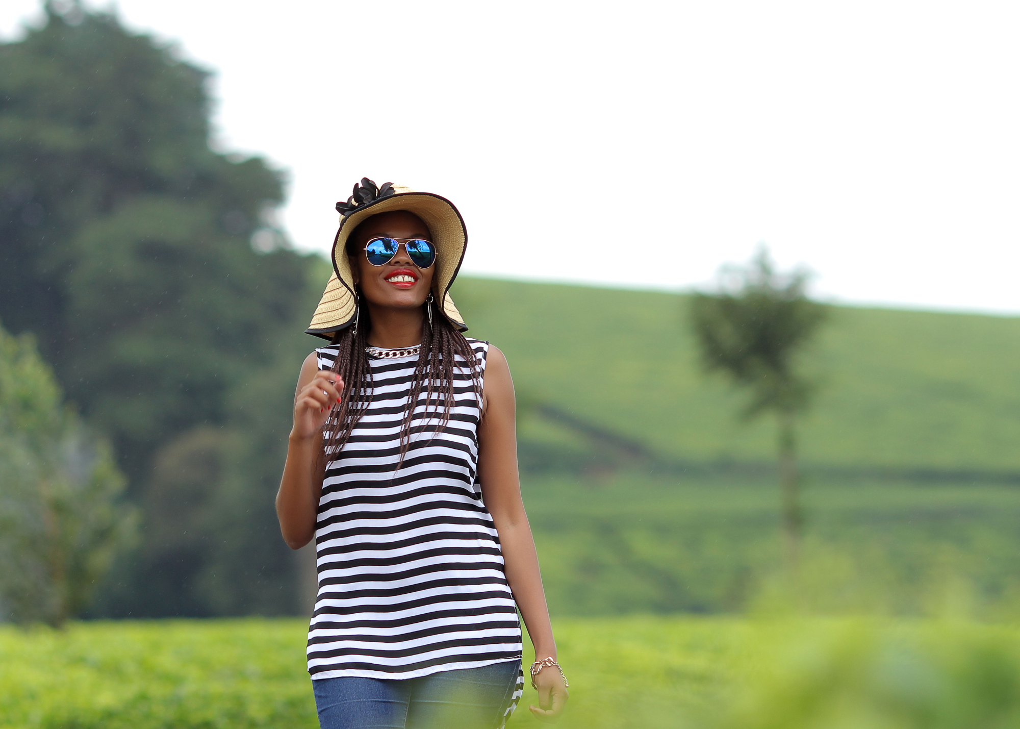Person wearing sunglasses and hat outdoors
