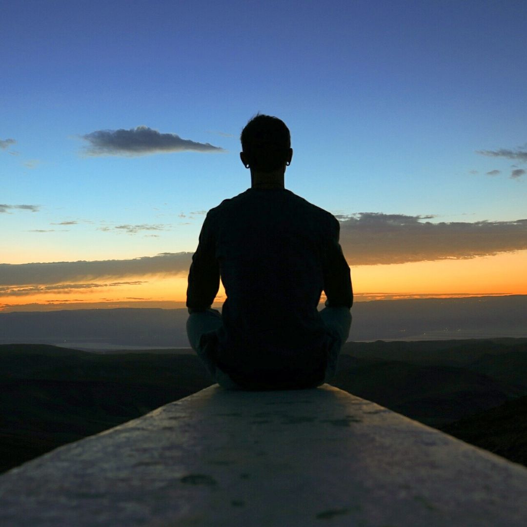 Person watching beautiful sunset