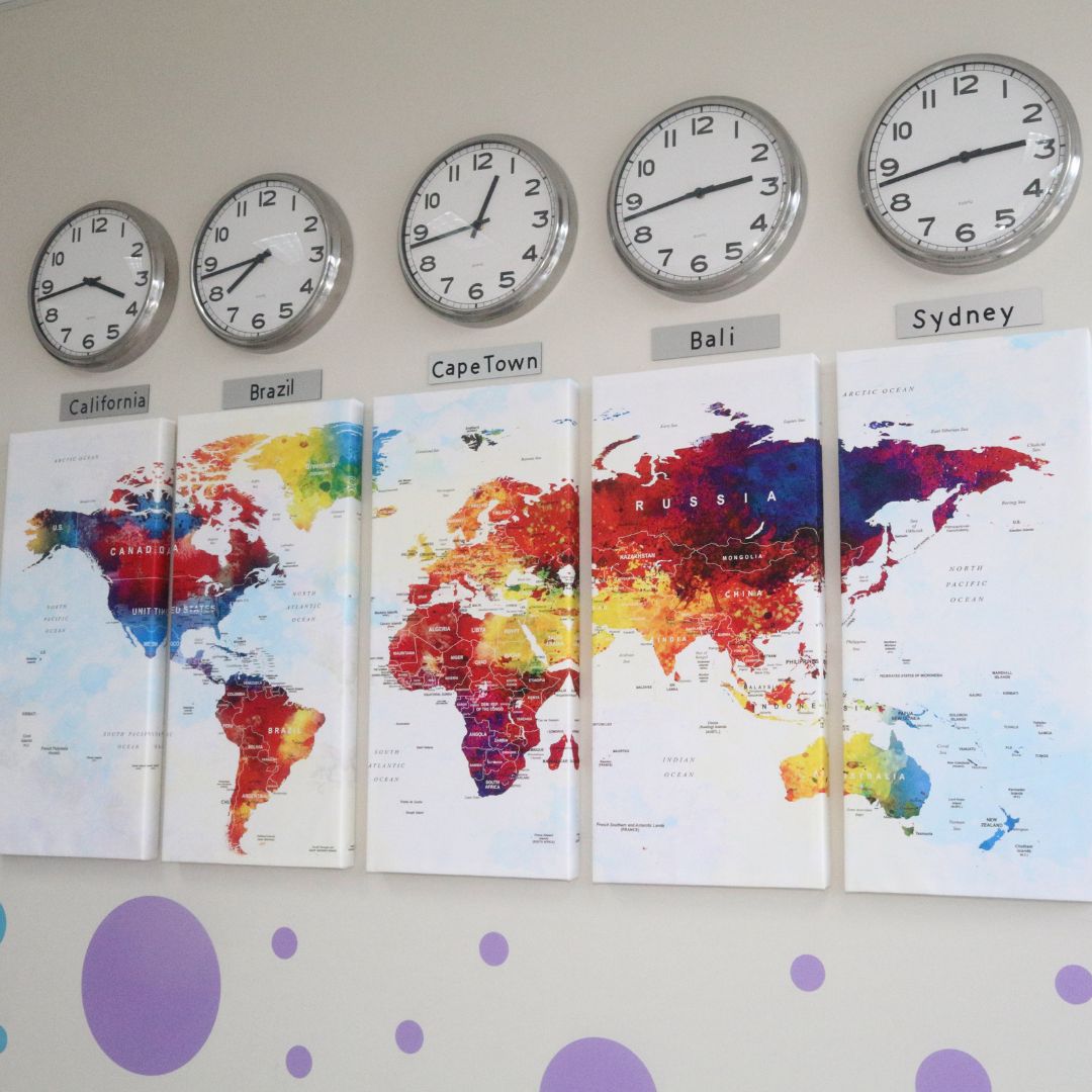 Clocks and maps showing different time zones